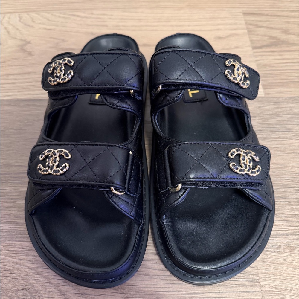 Black Smooth Leather Slip-On Sandals with Gold Logos